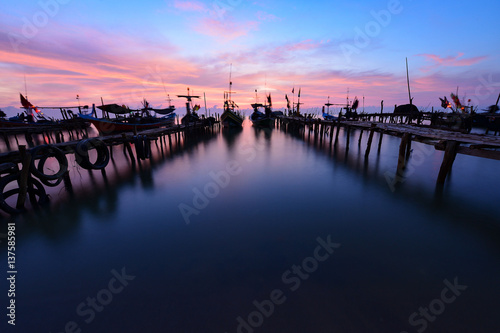 Fototapeta Naklejka Na Ścianę i Meble -  the bridge and boat fisherman on during Sunrise ,Thailand