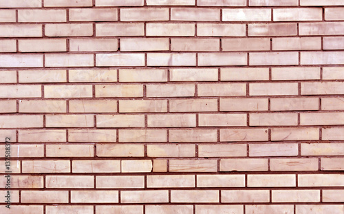 Red toned brick wall texture