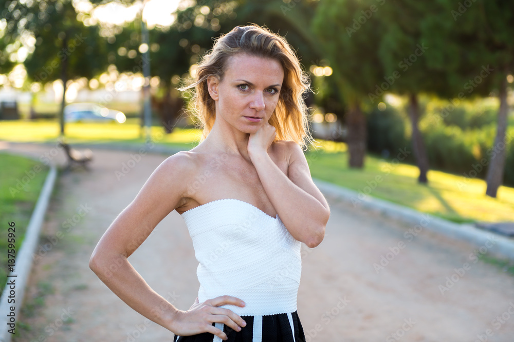 Beautiful blonde russian girl in the park Beautiful blonde russian girl in the park
