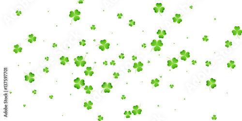 Saint Patrick's day clover background. Flying shamrock leaves.