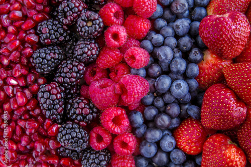 Fotografie Assorted Fresh Berries and Pomegranate Seeds