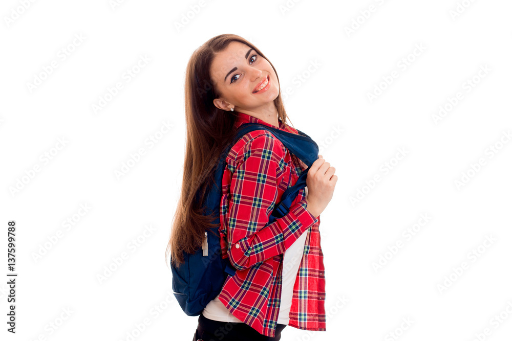 cheerful stylish smart student girl with backpack on her shoulders posing and smiling on camera isolated on white background cheerful stylish smart student girl with backpack on her shoulders posing and smiling on camera isolated on white background