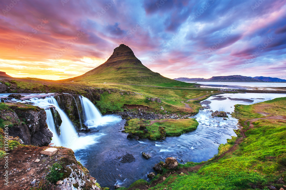 The picturesque sunset over landscapes and waterfalls. Kirkjufel The picturesque sunset over landscapes and waterfalls. Kirkjufel