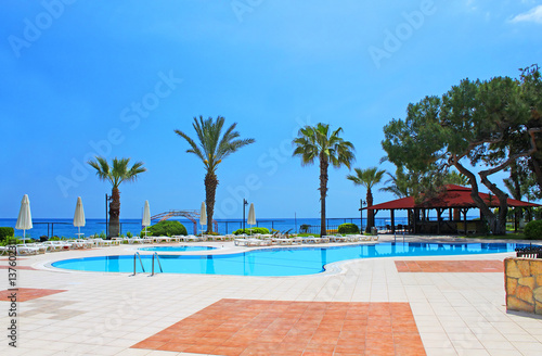 Swimming pool area near Mediterranean Sea in Antalya, Turkey photo
