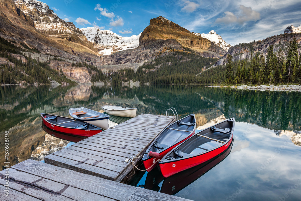 the iconic red canoes at Lake O'hara, British Columbia