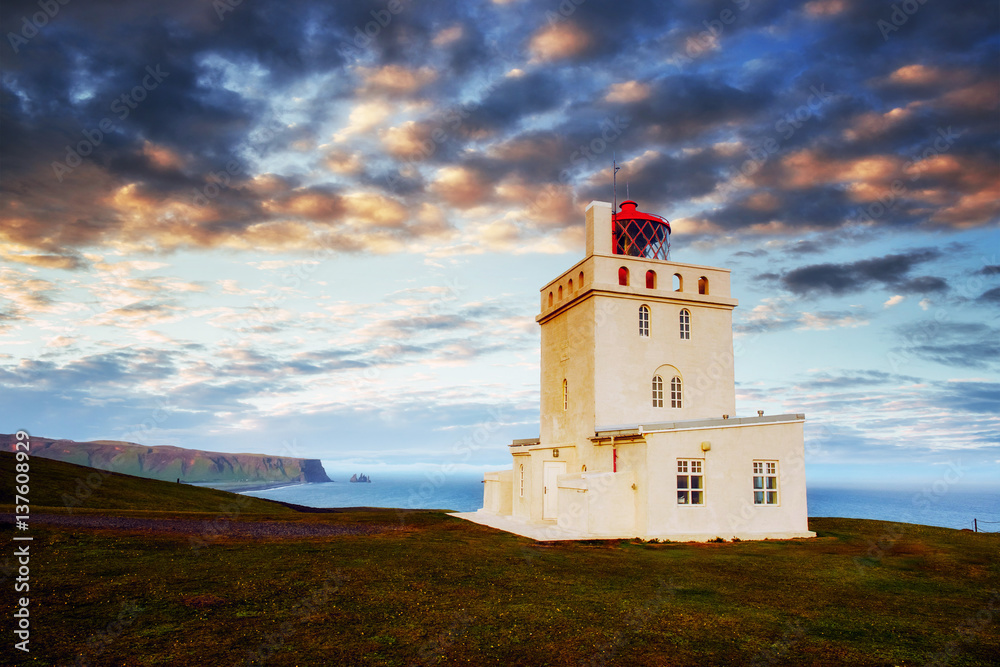 Beautiful white lighthouse at Cape Dyrholaey, South Iceland