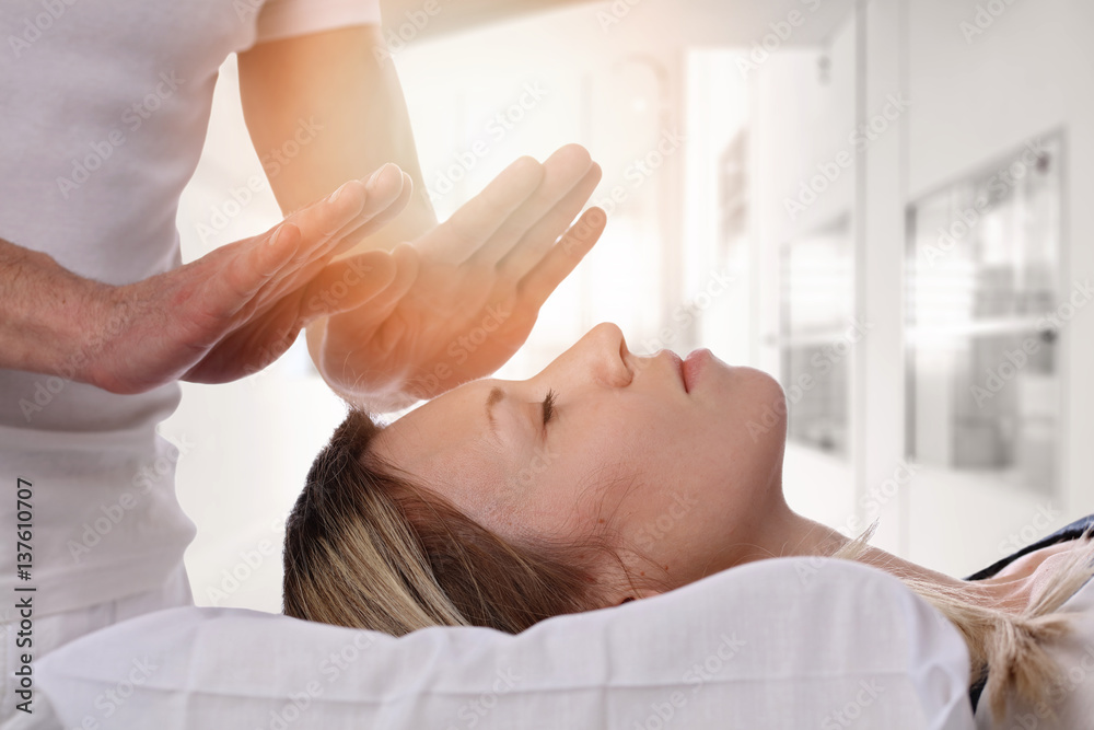 Woman having reiki healing treatment , alternative medicine concept. Woman having reiki healing treatment , alternative medicine concept.