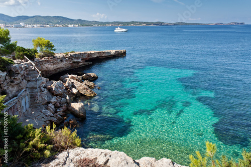 Beautiful secret lagoon at Ibiza. Luxury rest at Balearic Islands. Beautiful place for diving. Nature of the Mediterranean.