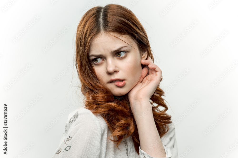 the woman turned her head back, twisting her lips the woman turned her head back, twisting her lips