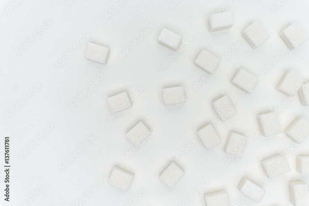 sugar cubes on a light background sugar cubes on a light background
