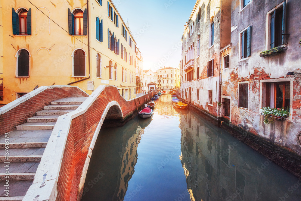 Gondolas on canal in Venice. is a popular tourist destination of Europe Gondolas on canal in Venice. is a popular tourist destination of Europe