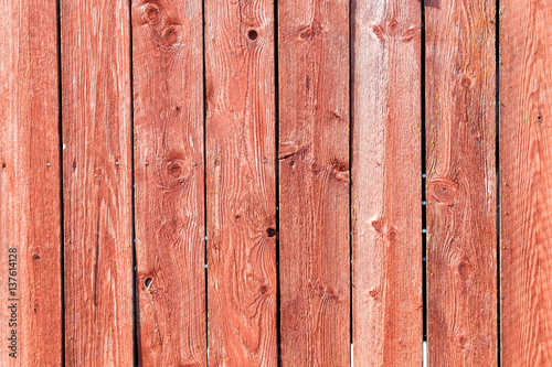 Traditional red wall made of planks