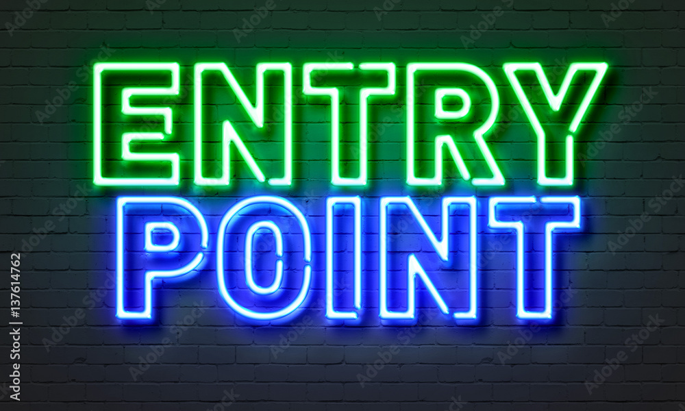 Entry point neon sign on brick wall background.