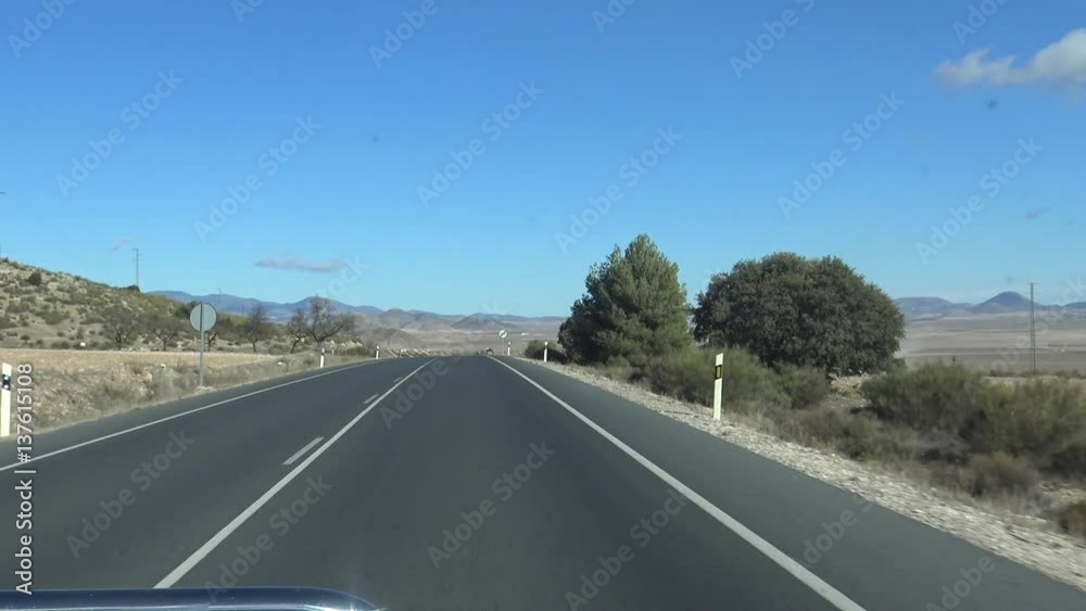 4K View of the road at car driving in the long road through beautiful countryside in Spain. Spanish landscape of the field-Dan 4K View of the road at car driving in the long road through beautiful countryside in Spain. Spanish landscape of the field-Dan