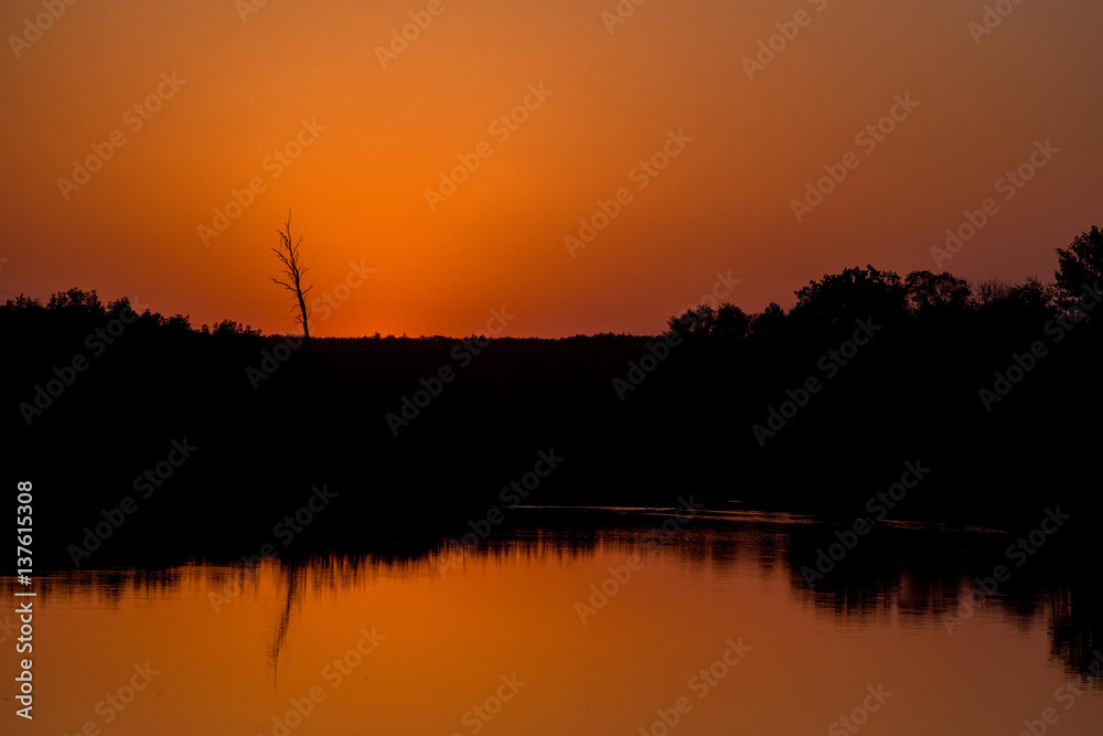Sunrise landscape with steppe and river