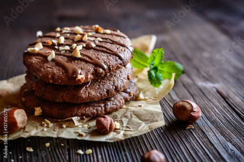 Delicious chocolate cookies with hazelnuts and topping