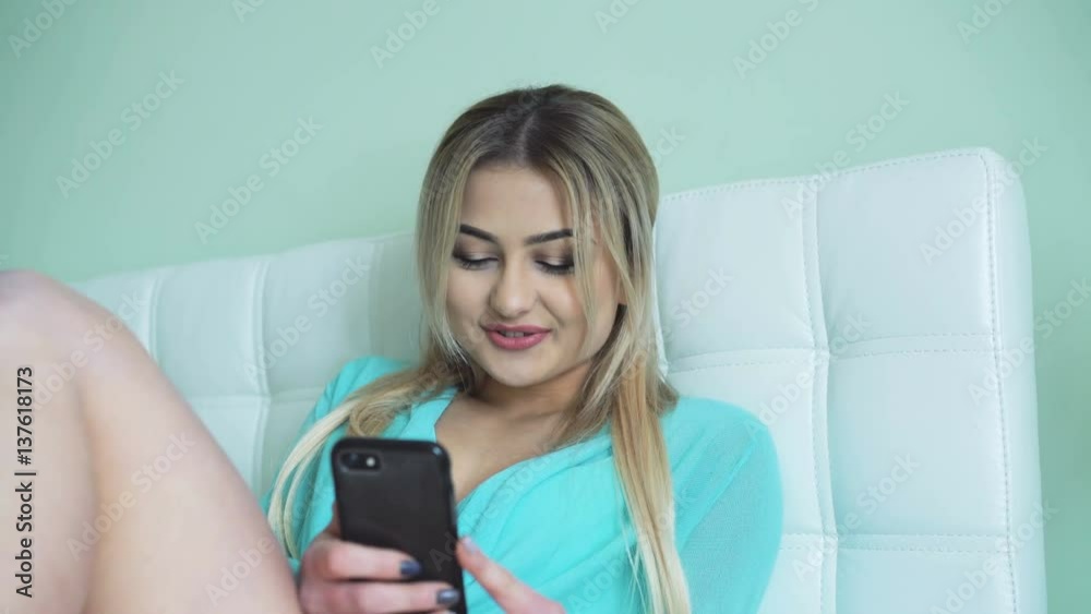 Pretty girl relaxing and speaking on the phone in 4K Pretty girl relaxing and speaking on the phone in 4K