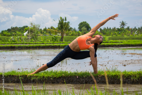 Girl doing yoga in Bali Indonesia 