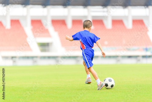 Boy play football © TinPong