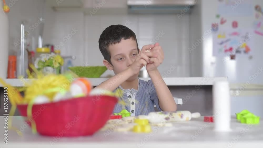 Young boy playing with dough at home Young boy playing with dough at home