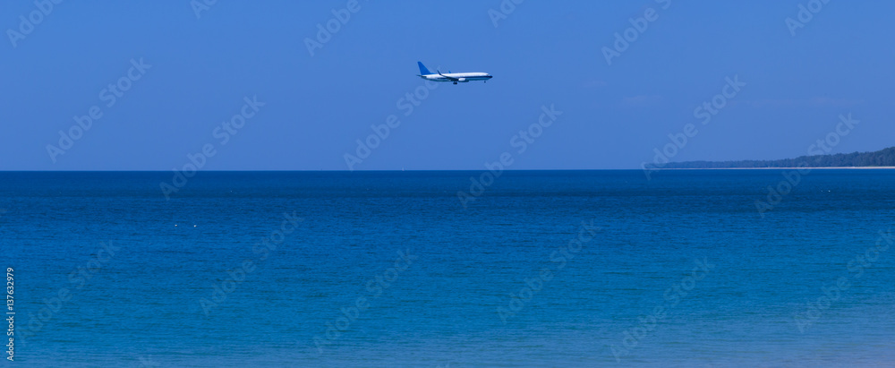 Airplane above sea