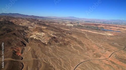 Aerial of The Mojave Desert,  mostly high desert area, that occupies a significant portion in the United States. Las Vegas is in  the Background. photo