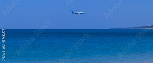 Airplane above sea