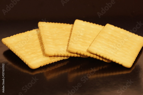 sweet crackers are isolated on a black background