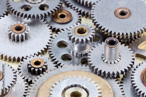 set of metal industrial gearwheels for machinery closeup