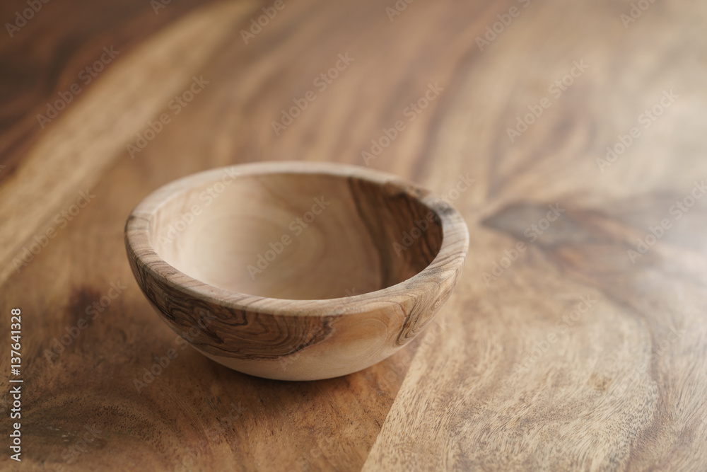 empty olive wood bowl on table empty olive wood bowl on table