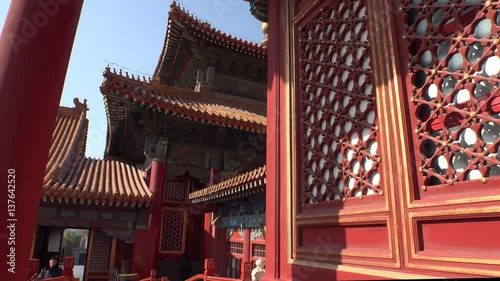 Forbidden city Beijing capital of China. Emperor palace red internal garden. Old Asian culture. Beautiful summer day, Blue sky. Cinematic