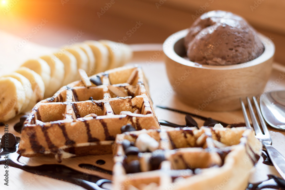 Belgian waffles with fruit and chocolate, forest fruit, all homemade, delicious batter.