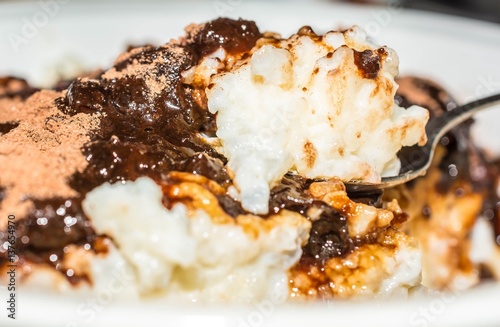 Rice milk porridge with cocoa and cherry marmalade