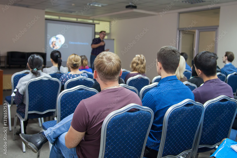 The image of a conference in a conference hall