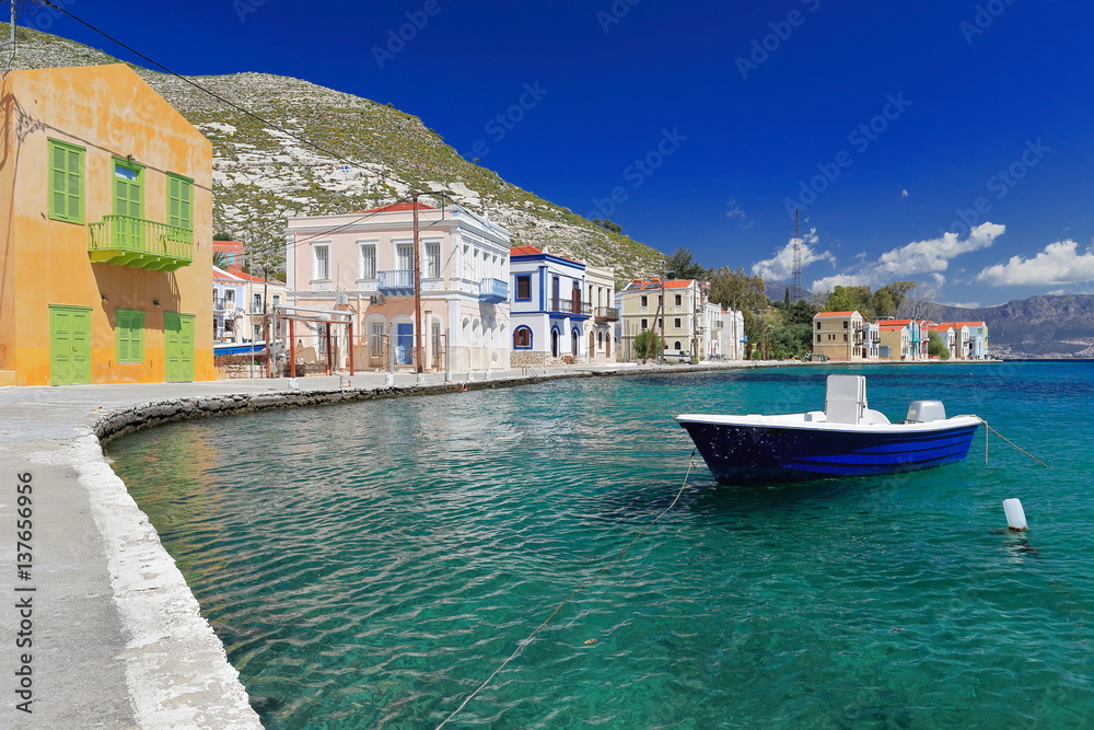 Fototapeta premium Boat moored-west side main harbor-Pera Meria district. Kastellorizo-Greece. 1606