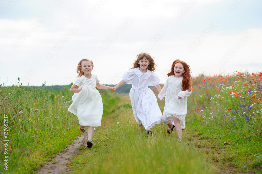 Three girls run approaching. Children playing at fresh Three girls run approaching. Children playing at fresh