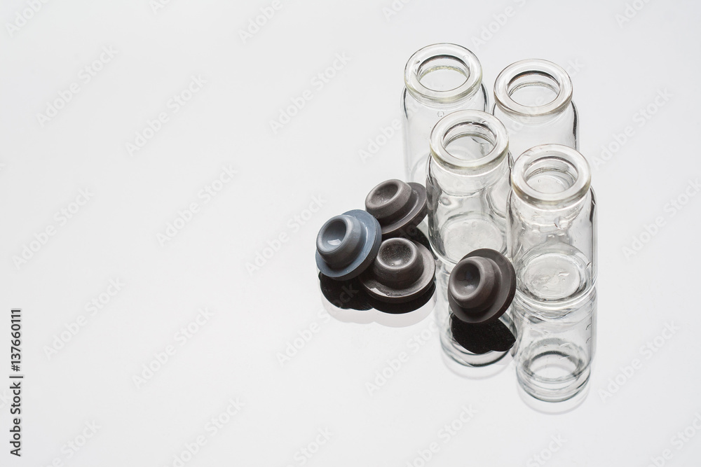 Medical glass flask on a white background Medical glass flask on a white background