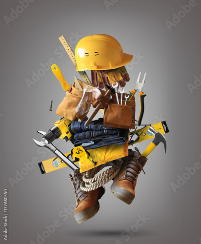 Construction tools with a shoes and a helmet photo