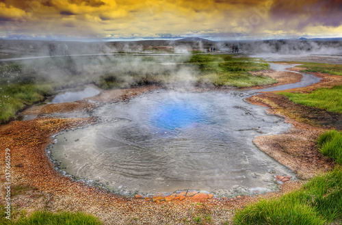 Hot steam over the source of the thermal waters  Hveravellir  Iceland. White nights in Iceland.