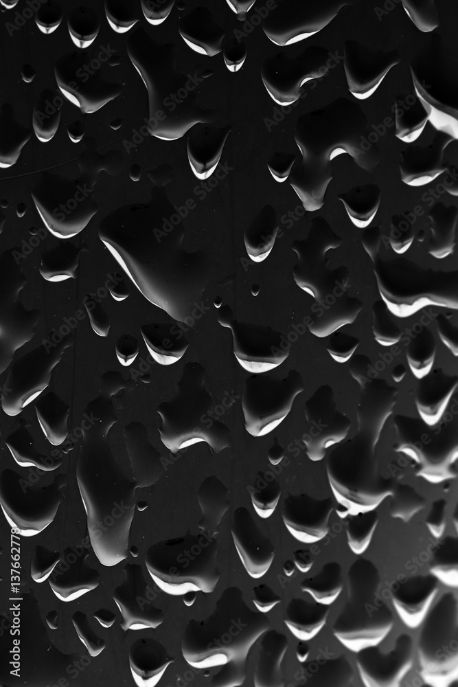 Water droplets on a black background Water droplets on a black background