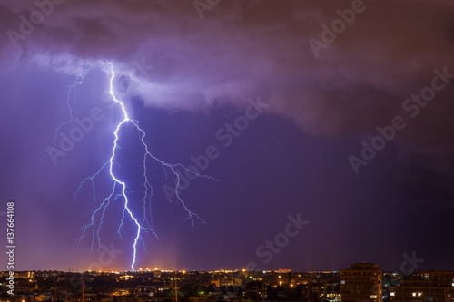 Beautiful lightning above the night city