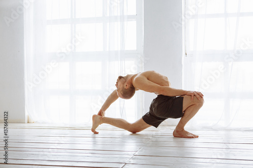 Man practicing advanced yoga. A series of yoga poses. Lifestyle concept