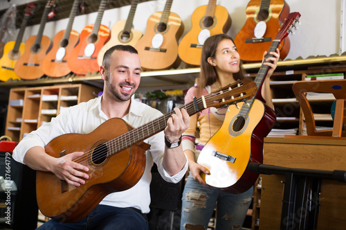 customers in music instruments shop