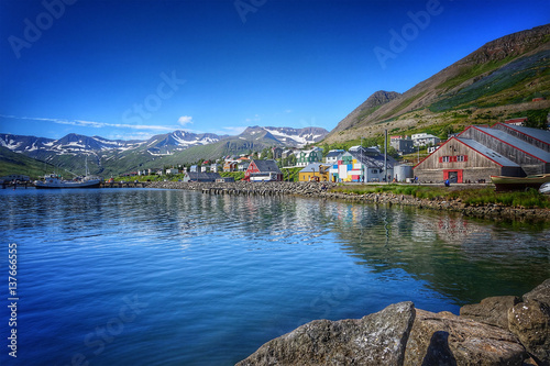 beautiful little town Siglufjordur in northern Iceland on a sunny day