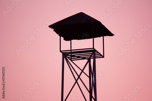 observation tower with silhouette background
