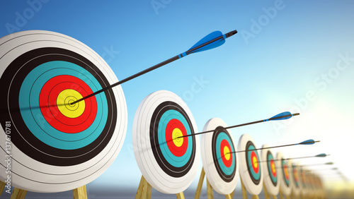 Arrows hitting the centers of targets - success business concept. 3d render photo