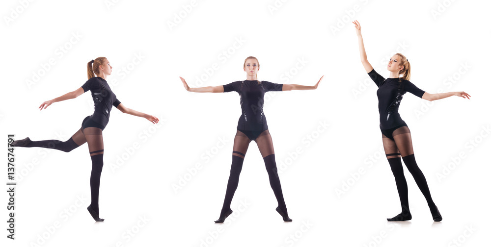 Fototapeta premium Young woman dancing on white background
