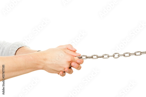 Man hand holding long chain, isolated.