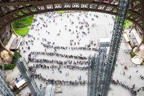 Line of people for entrance on the Eiffel Tower Paris, France