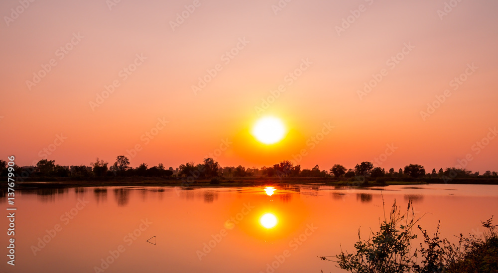 Beautiful landscape sunset at the river in the evening.